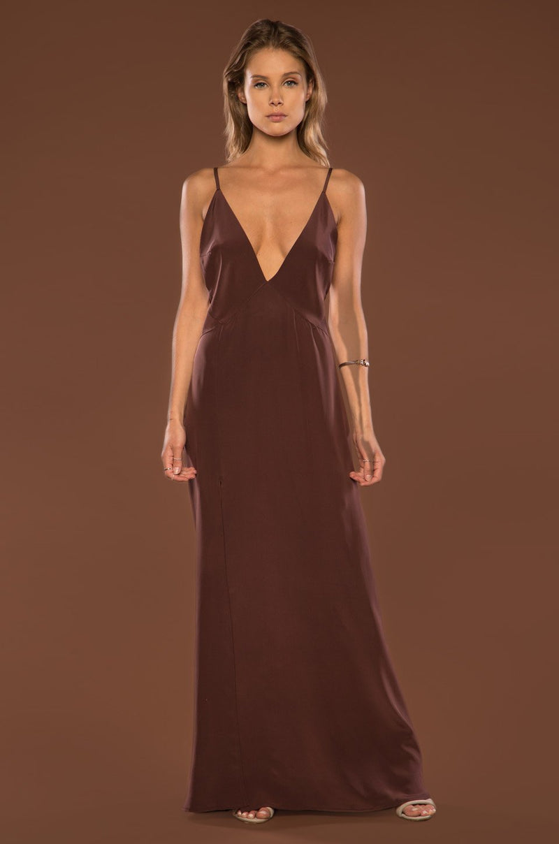 elvira hancock silk dress #michellepfeiffer as Elvira Hancock in Scarface dazzled audiences in this  unforgettable blue satin dress, designed by the brilliant Patricia Norris.  The sleek silhouette, bold color, and plunging